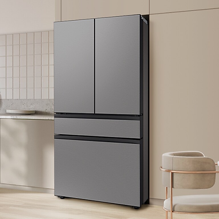 Stainless steel French door refrigerator in modern kitchen Stainless steel French door refrigerator in modern kitchen