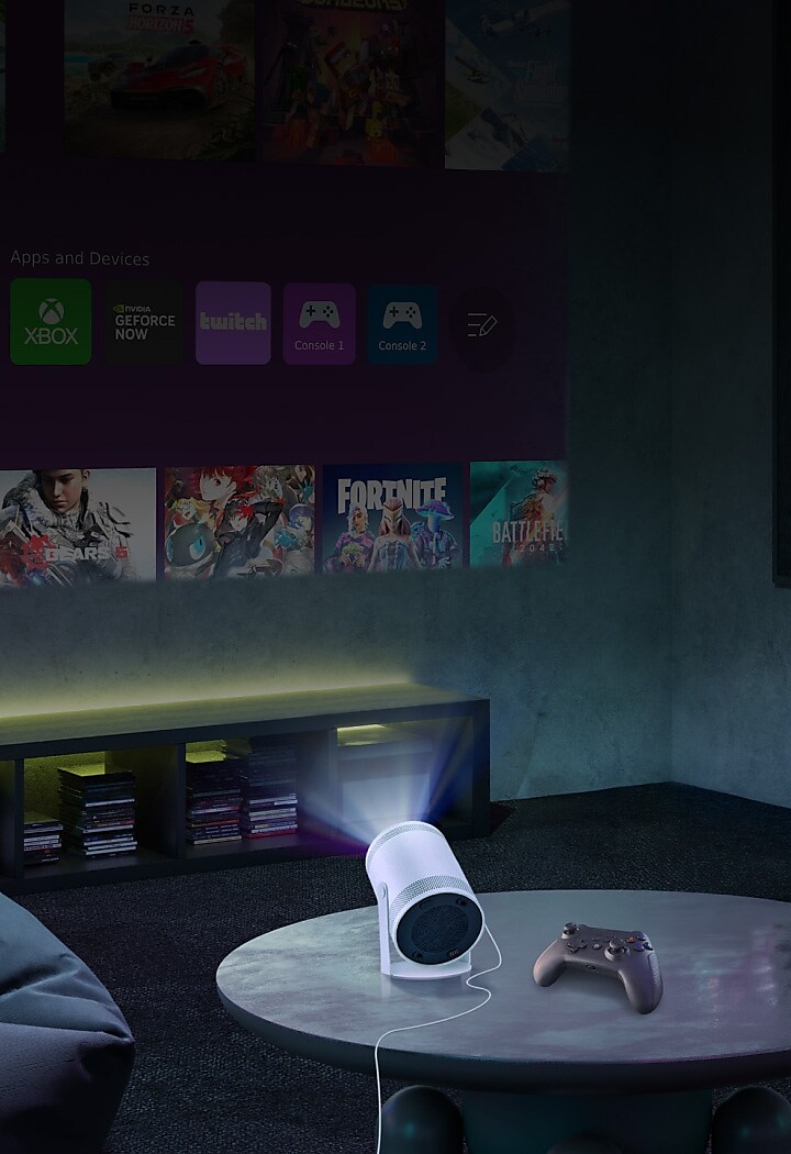 Dark room w the Freestyle on the coffee table projecting onto the wall. Dark room w the Freestyle on the coffee table projecting onto the wall.